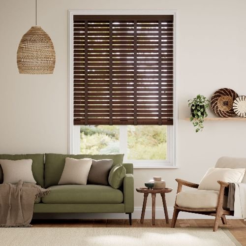 Wooden venetian blind install in living room